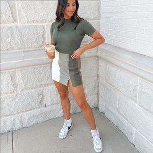 Vestique faux leather stripped mini skirt